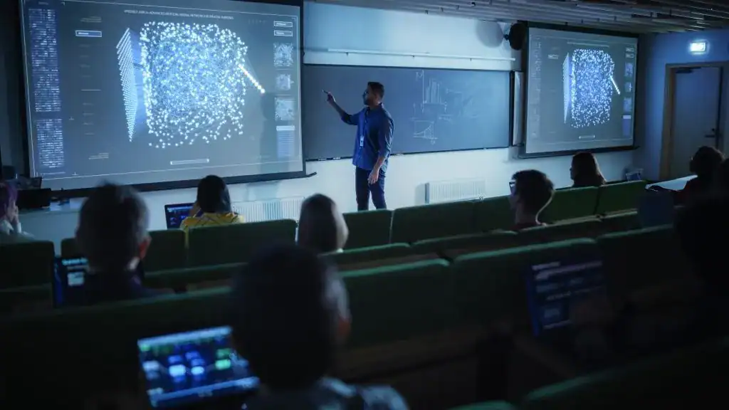 Modern classroom with digital screens and students learning technology.