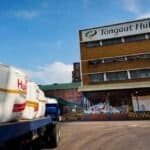 Tongaat Hulett industrial building with bags of raw materials outside.