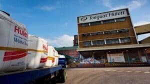 Tongaat Hulett industrial building with bags of raw materials outside.