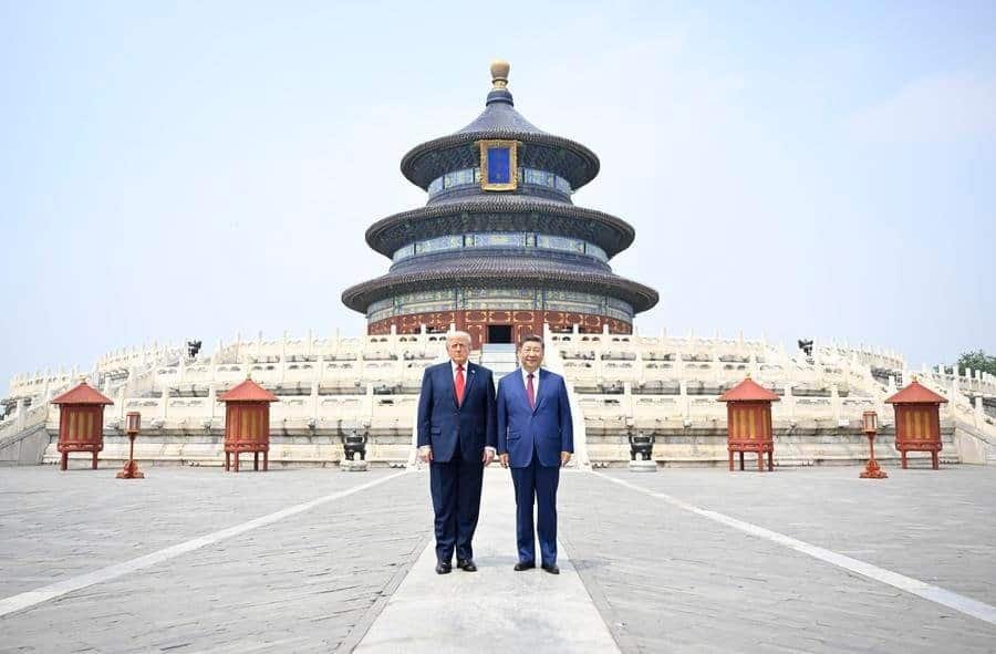 Chinese President Xi Jinping and U.S. President Donald Trump have a photo taken in front of the Hall of Prayer for Good Harvests