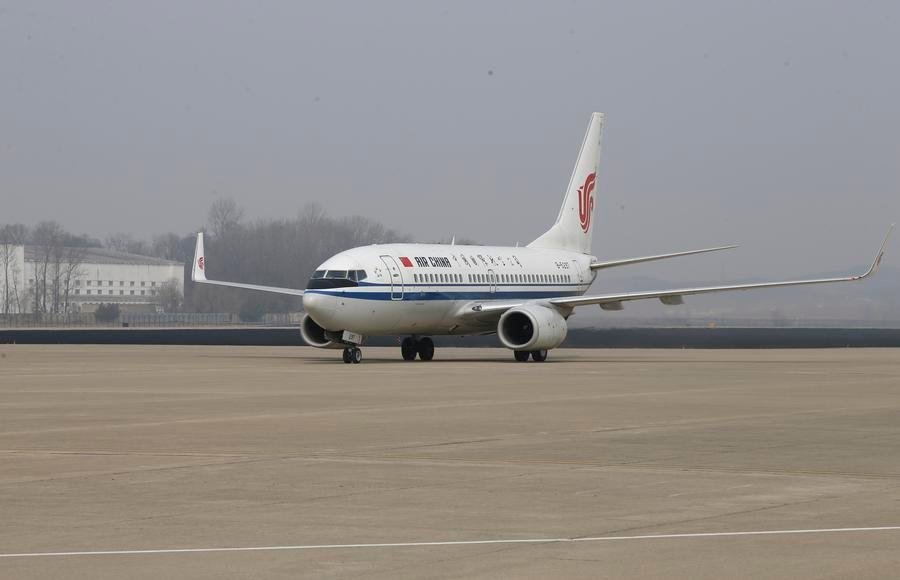 An Air China passenger plane from Beijing arrives at Sunan International Airport in Pyongyang