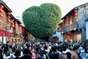 People visit the historic and cultural city block Three Lanes and Seven Alleys in Fuzhou, southeast China's Fujian Province, Feb. 21, 2026. Many visitors flocked to historic blocks in Fuzhou to celebrate the Chinese New Year during the Spring Festival holiday.
