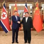 Xi Jinping, general secretary of the Communist Party of China Central Committee and Chinese president, shakes hands with Kim Jong Un, general secretary of the Workers' Party of Korea (WPK) and president of the State Affairs of the Democratic People's Republic of Korea (DPRK) in Pyongyang.
