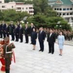 Xi Jinping, general secretary of the Communist Party of China Central Committee and Chinese president, pays homage to the China-DPRK Friendship Tower with his wife Peng Liyuan, in the company of Kim Jong Un, general secretary of the Workers' Party of Korea and president of the State Affairs of the Democratic People's Republic of Korea (DPRK), and Kim's wife Ri Sol Ju, in Pyongyang, the DPRK