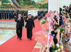 Xi Jinping with Kim Jong Un