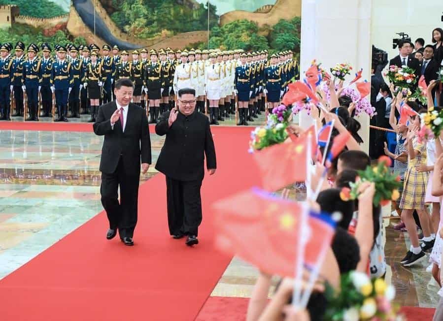 Xi Jinping with Kim Jong Un