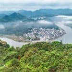 An aerial drone photo taken on May 22, 2026 shows a loquat plantation on the bank of Xin'an River in Shexian County of Huangshan, east China's Anhui Province.