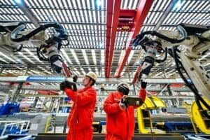 Workers operate robots at an offshore oil and gas platform at the Binhai New Area, in north China's Tianjin on Jan. 29, 2026.  (Photo by Du Penghui/Xinhua)