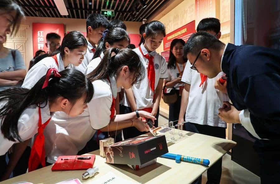 Students of a local junior high school have a study tour course at the site of an exhibition commemorating the inauguration of radio and code communications of the Communist Party of China in Shanghai, east China, June 2, 2026. (Xinhua/Shan Yuqi)