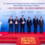 The Chinese side presents Kazakh guests with copies of the Kazakh edition of the fourth volume and the Russian edition of the fifth volume of "Xi Jinping: The Governance of China" at an event promoting the fifth volume of the book in Astana, Kazakhstan, July 15, 2026. The event was held here on Wednesday. (Xinhua/Li Renzi)