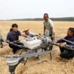 Han Xuerun (1st L) instructs villagers to use a plant protection drone in Hubin Town of Boxing County, Binzhou, east China's Shandong Province, June 15, 2026. (Photo by Chen Bin/Xinhua)