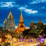 This photo taken on July 14, 2026 shows a view of the Starlight Night Market in Jinghong, Xishuangbanna Dai Autonomous Prefecture, southwest China's Yunnan Province. The Starlight Night Market, located in Jinghong of Xishuangbanna Dai Autonomous Prefecture, has witnessed a surge in visitor arrivals during the summer peak tourism season. Featuring local delicacies, ethnic culture and diverse nighttime consumption options, this night market reflects the vitality of local cultural and tourism market. (Photo by Ren Jun/Xinhua)