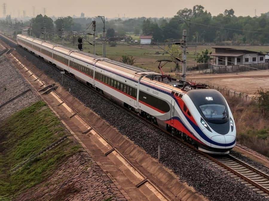 An aerial drone photo taken on April 13, 2026 shows a train of the China-Laos Railway, departing from Kunming of southwest China's Yunnan Province, arriving in Vientiane, Laos. (Photo by Xia Ningqin/Xinhua)