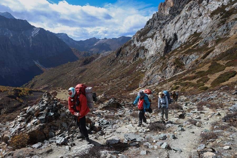 Hikers are seen at the Yading scenic spot in Daocheng County of Tibetan Autonomous Prefecture of Garze, southwest China's Sichuan Province, Oct. 28, 2025.