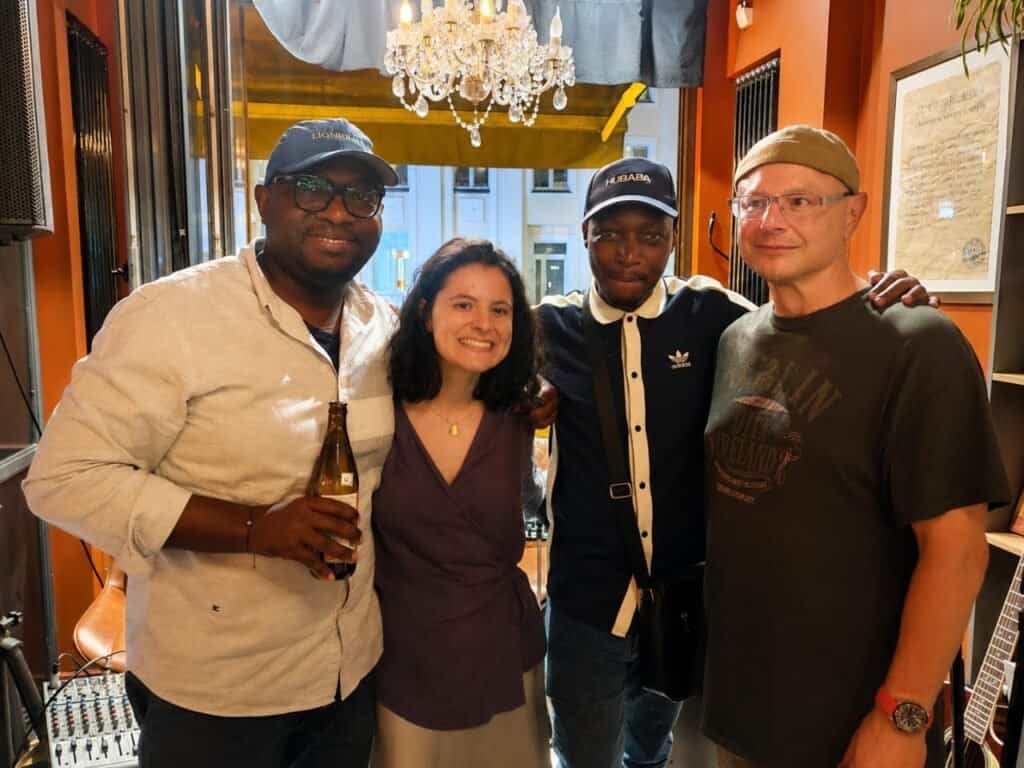 The author, Kalumbu Lumpa, with friends and a Russian Folk musician, far right.