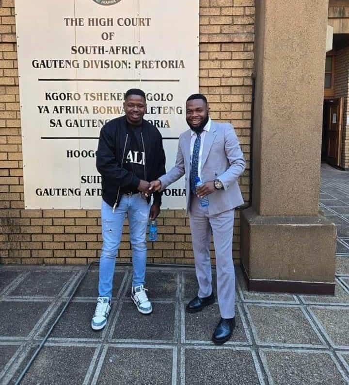 TMDP officer Peter Nonyane and Attorney Matimba Austin Vukeya of MAV Inc Attorneys outside the Pretoria High Court.