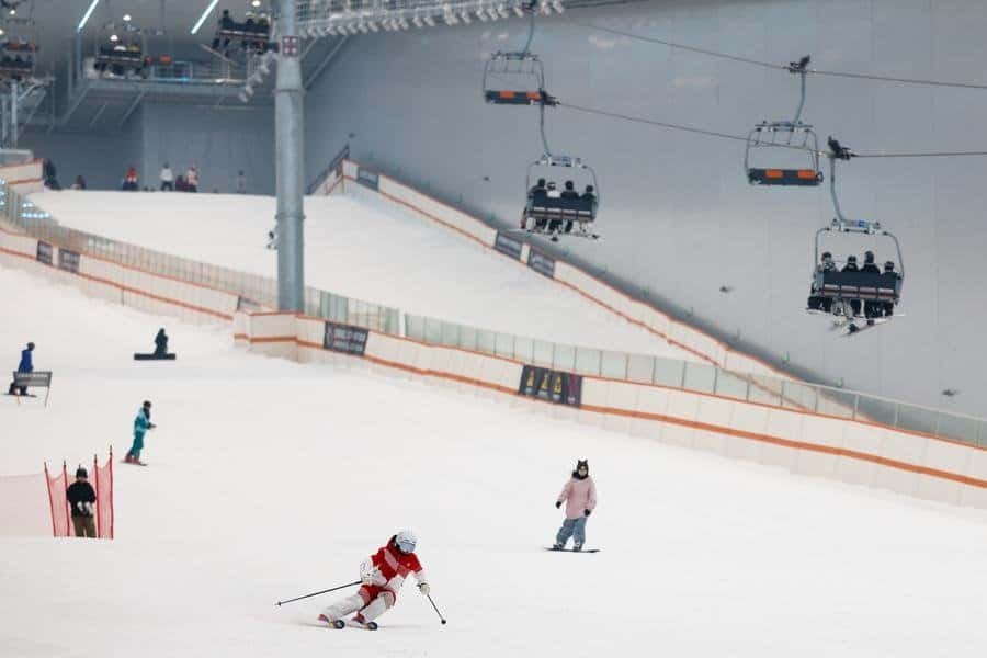People enjoy skiing at an indoor ski resort in Wuhan, central China's Hubei Province, July 31, 2026. (Xinhua/Wu Zhizun)
