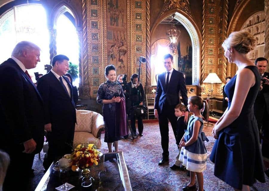 Chinese President Xi Jinping, his wife, Peng Liyuan, U.S. President Donald Trump and First Lady Melania Trump listen as Trump's grandchildren sing a Chinese folk song and recite classics of Chinese literature in the Mar-a-Lago resort in Florida, the United States, April 6, 2017. (Xinhua/Lan Hongguang)