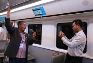 A guest films his passenger experience on Guangzhou Metro Line 18 in Guangzhou, south China's Guangdong Province, Sept. 3, 2026. (Xinhua/Gao Jing)