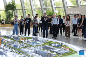 Guests visit Chinese wind turbine maker Mingyang Smart Energy Group in Zhongshan City, south China's Guangdong Province, Sept. 4, 2026.