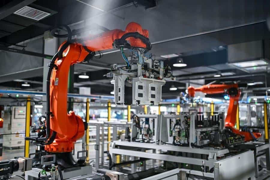 Robotic arms work in an energy storage production workshop at the Sigenergy Nantong Smart Energy Center in Nantong, east China's Jiangsu Province, July 24, 2026. (Xinhua/Chen Yehua)
