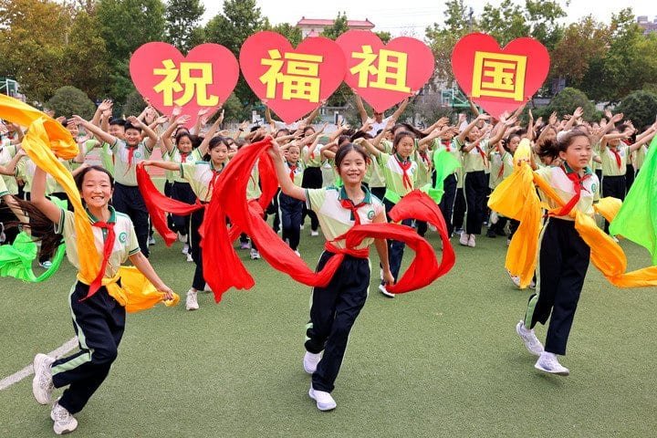 Students dance to celebrate the upcoming National Day in Shizhong District of Zaozhuang, east China's Shandong Province, Sept. 29, 2026. Various events are held across China in celebration of the upcoming National Day. (Photo by Sun Zhongzhe/Xinhua)