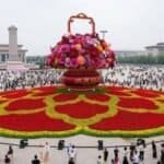 National Day Floral Displays in Festive Beijing Tell Tough Past, Promising Future